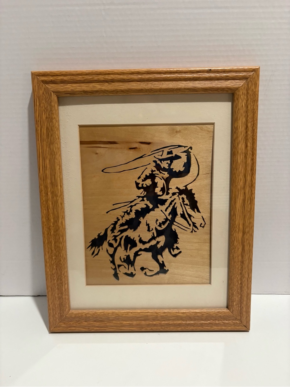 Western Bull Rider Woodcut Framed Art in Oak Frame